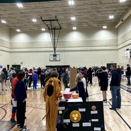 Students and parents enjoying the science fair