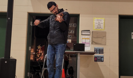 man with violin playing